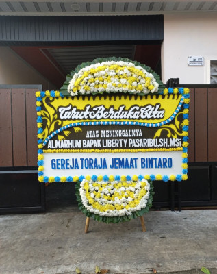 Papan Bunga Duka di Melai